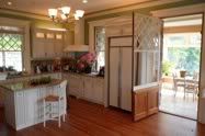 The spacious kitchen is next to the conservatory.